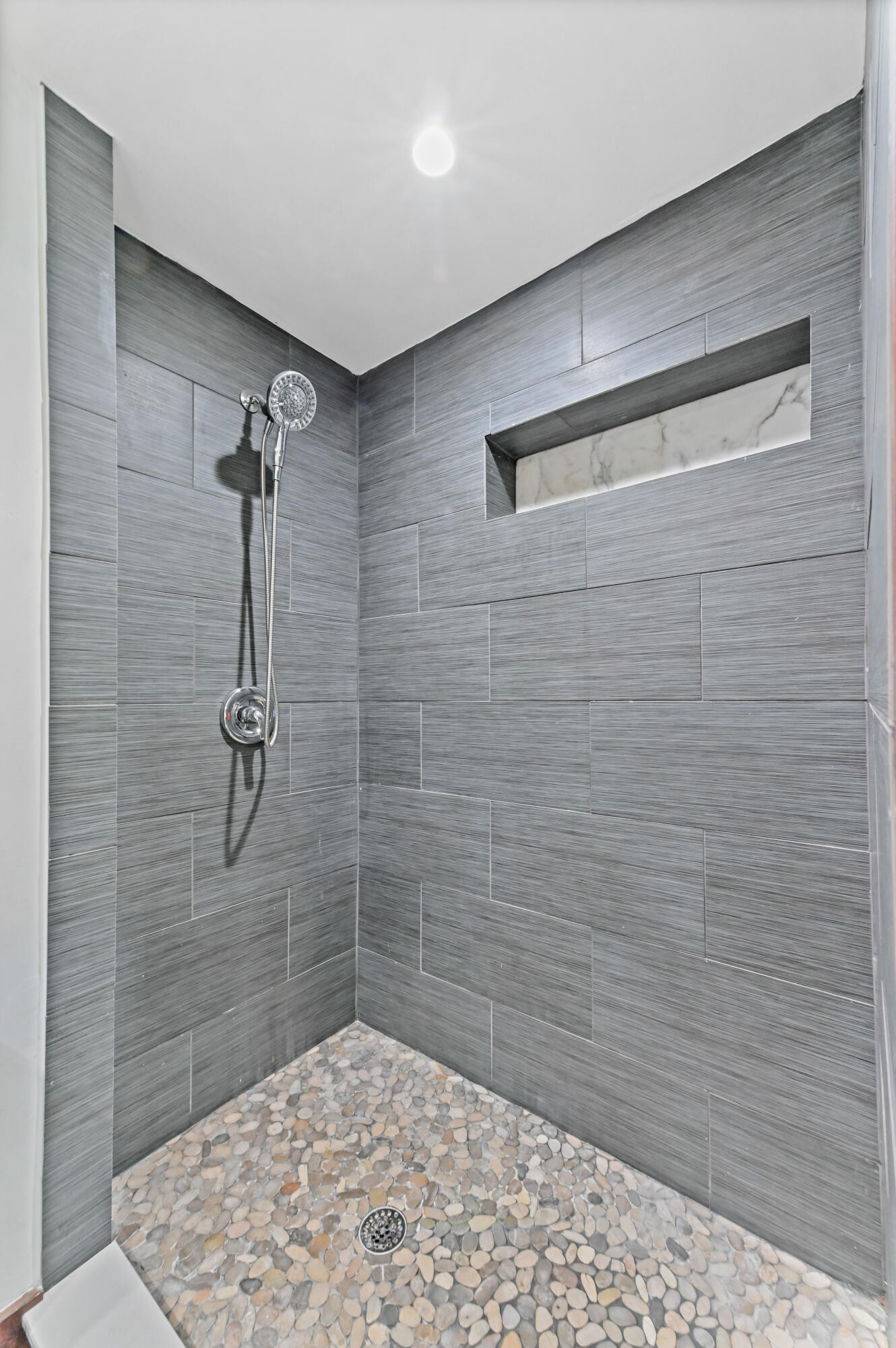 98 Cleveland Road Lake Worth, FL 33467 - Photo 23 of 30 a bathroom with a shower