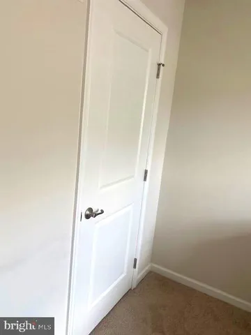 an empty room with a door