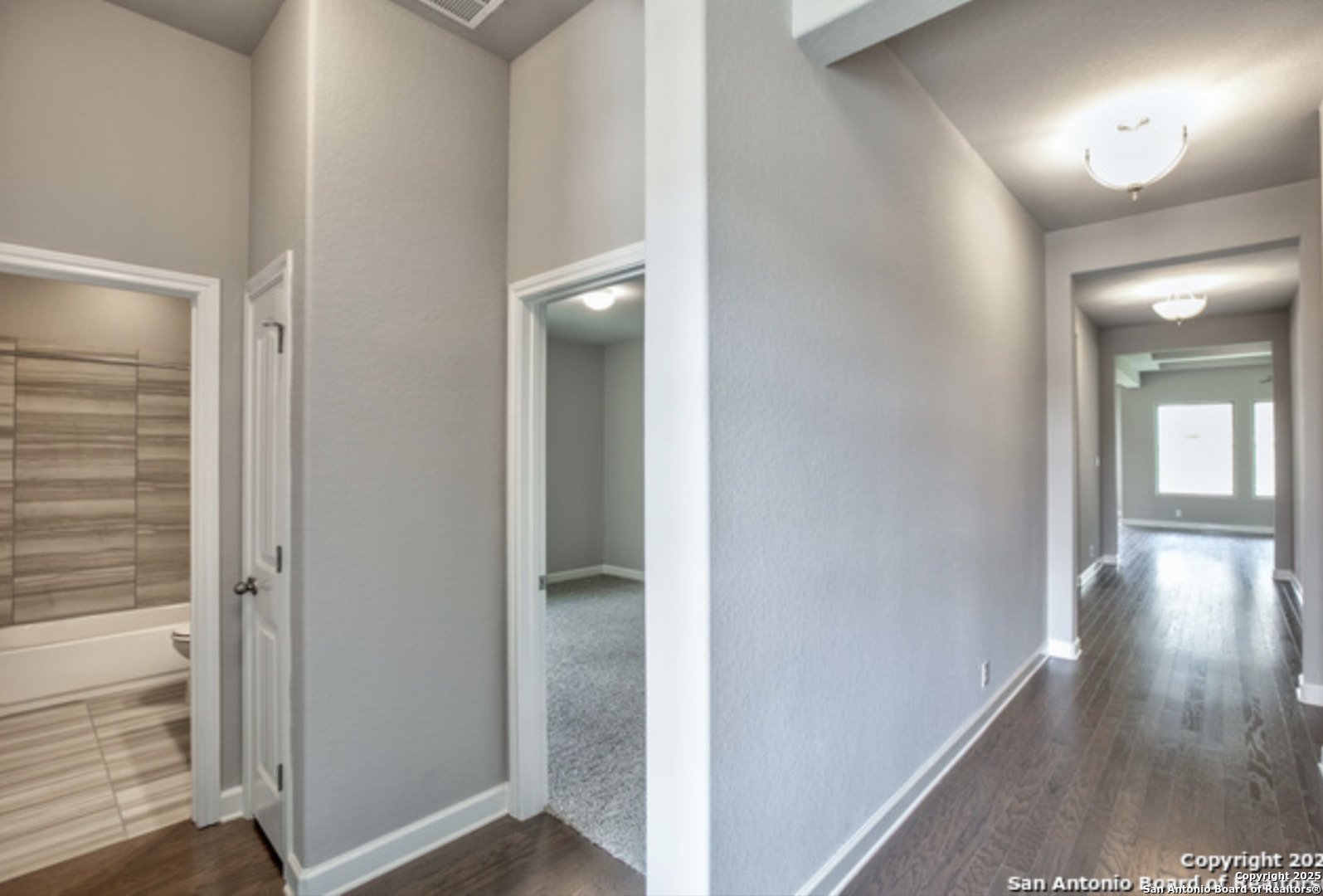 622 Singing Creek Spring Branch, TX 78070 - Photo 4 of 32 a view of a hallway with wooden floor