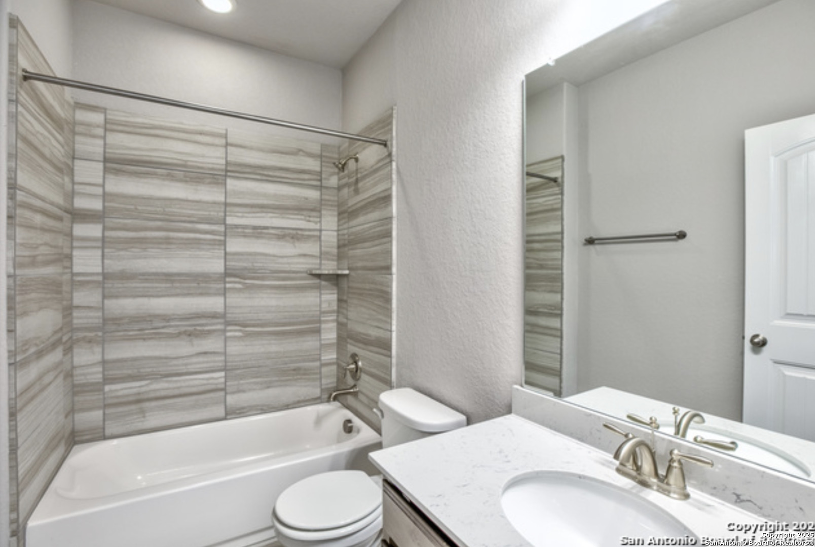 622 Singing Creek Spring Branch, TX 78070 - Photo 7 of 32 a bathroom with a sink toilet and shower