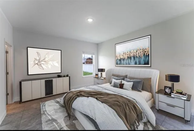 a bedroom with bed and window