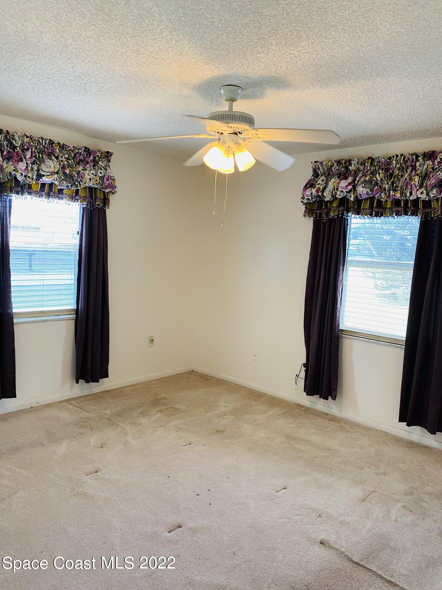 2097 Beekman Street Northeast Palm Bay, FL 32905 - Photo 14 of 35 beekman main bdrm
