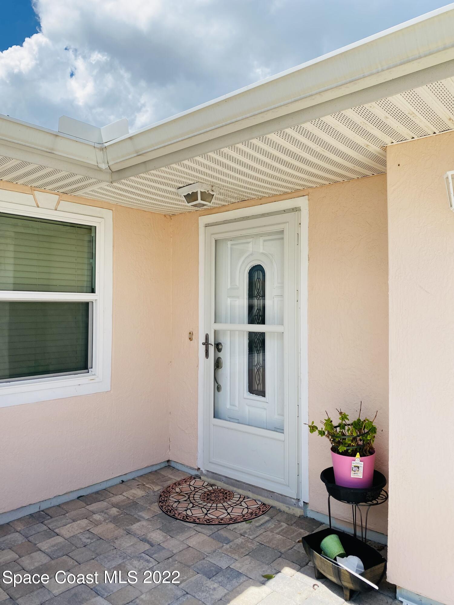 2097 Beekman Street Northeast Palm Bay, FL 32905 - Photo 2 of 35 beekmen front