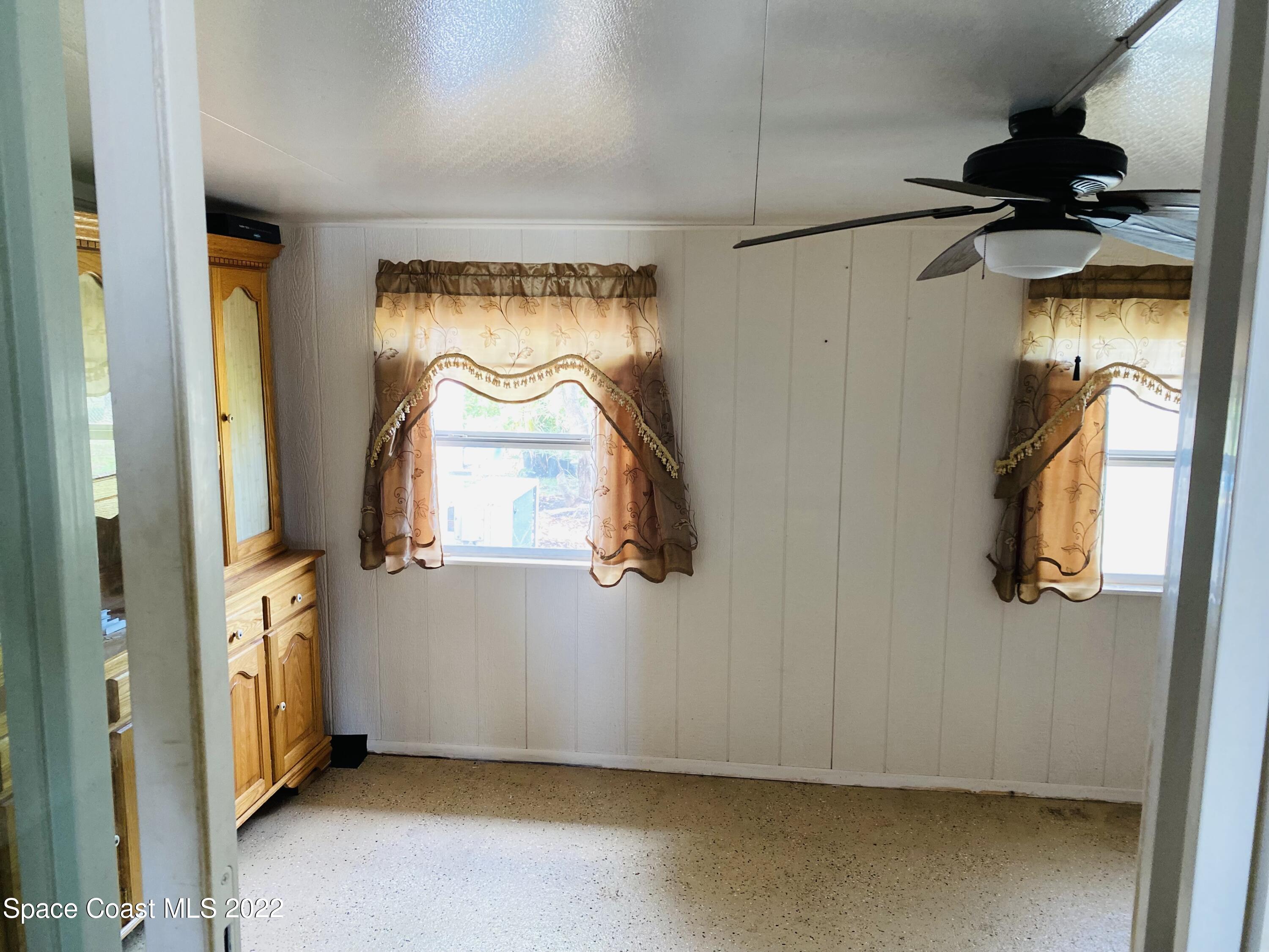 2097 Beekman Street Northeast Palm Bay, FL 32905 - Photo 26 of 35 beekman dining enclosed
