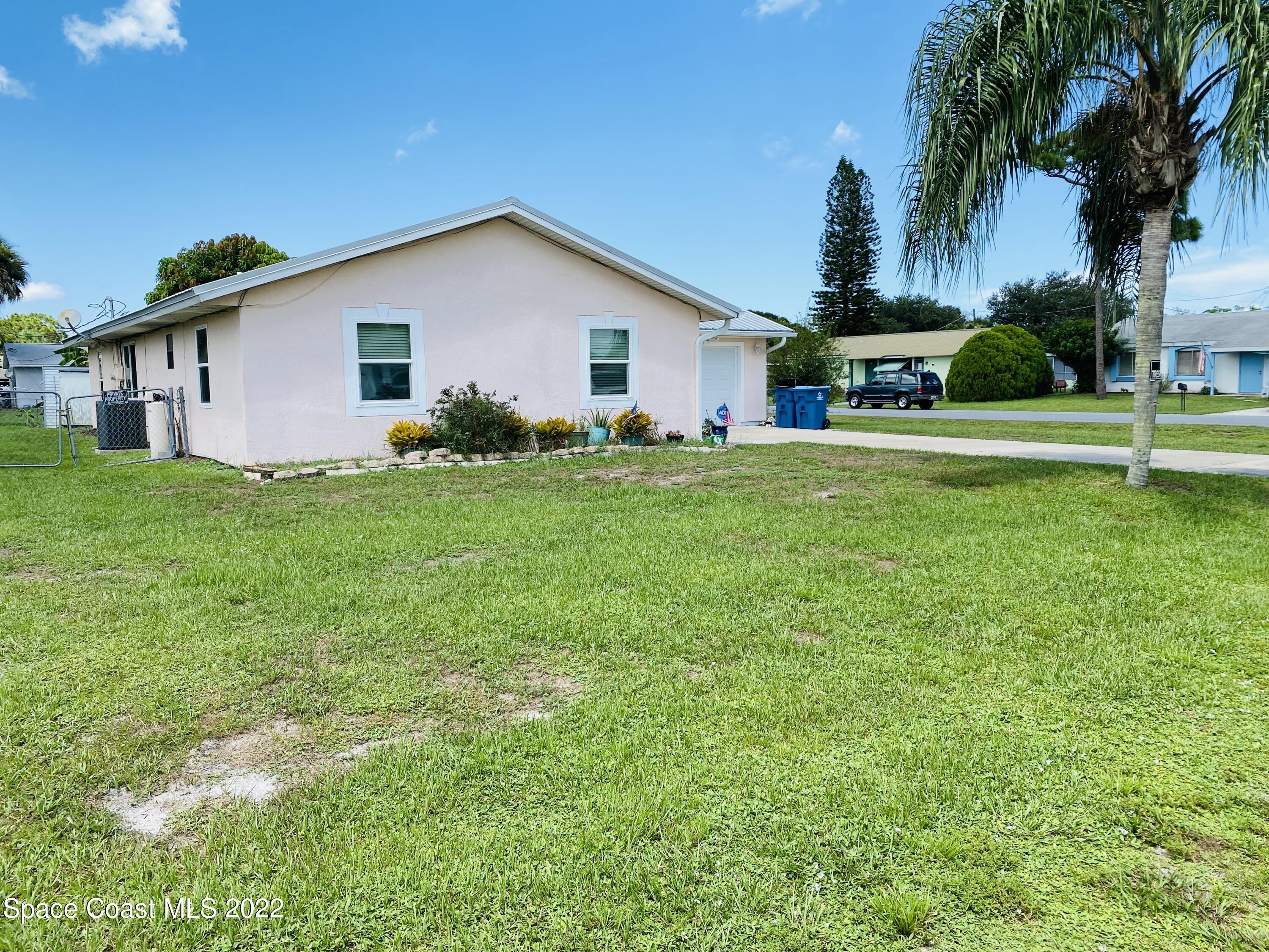 2097 Beekman Street Northeast Palm Bay, FL 32905 - Photo 3 of 35 beekman left front