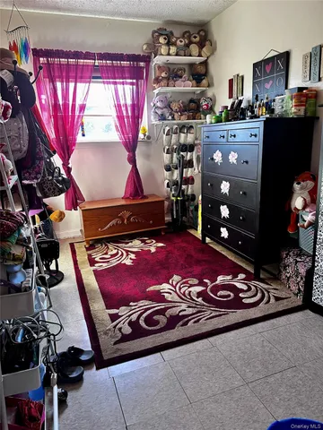 a room with lots of different colored cloths