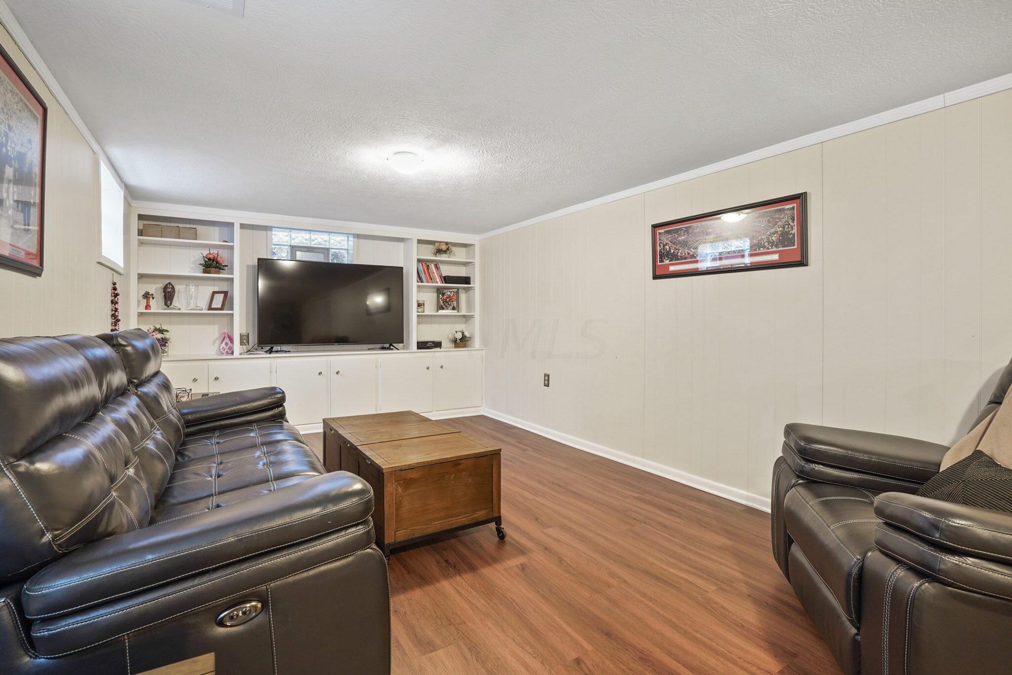 2338 Edgevale Road Columbus, OH 43221 - Photo 22 of 27 Entire wall of built in shelving