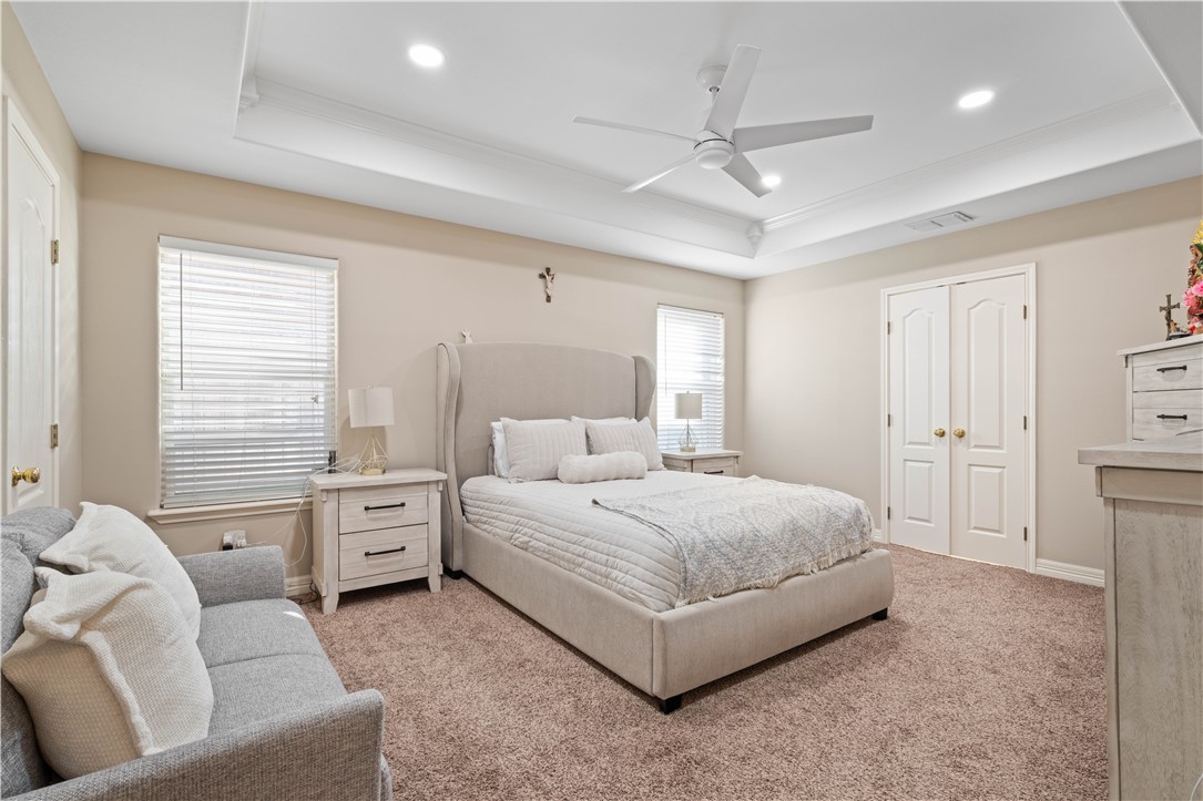 2601 Wool Drive Corpus Christi, TX 78414 - Photo 20 of 25 a spacious bedroom with a bed and a couch