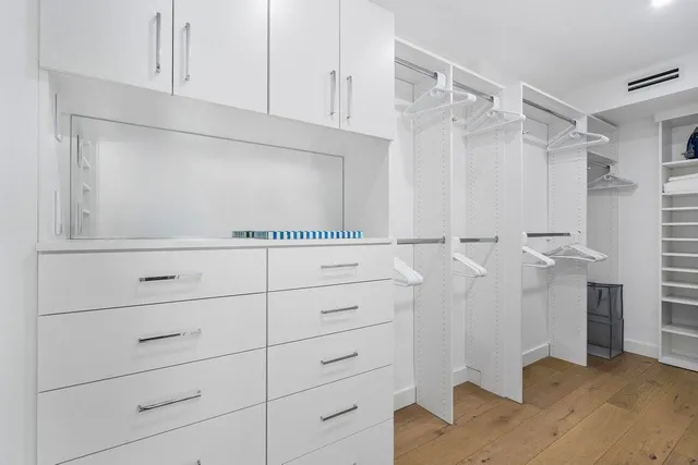 a view of an empty walk in closet