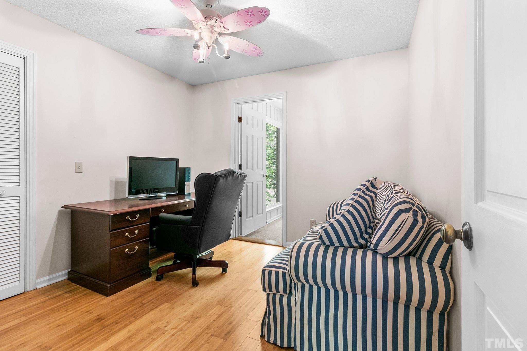 7068 Oak Road Sanford, NC 27332 - Photo 24 of 34 a view of a workspace with furniture and a window