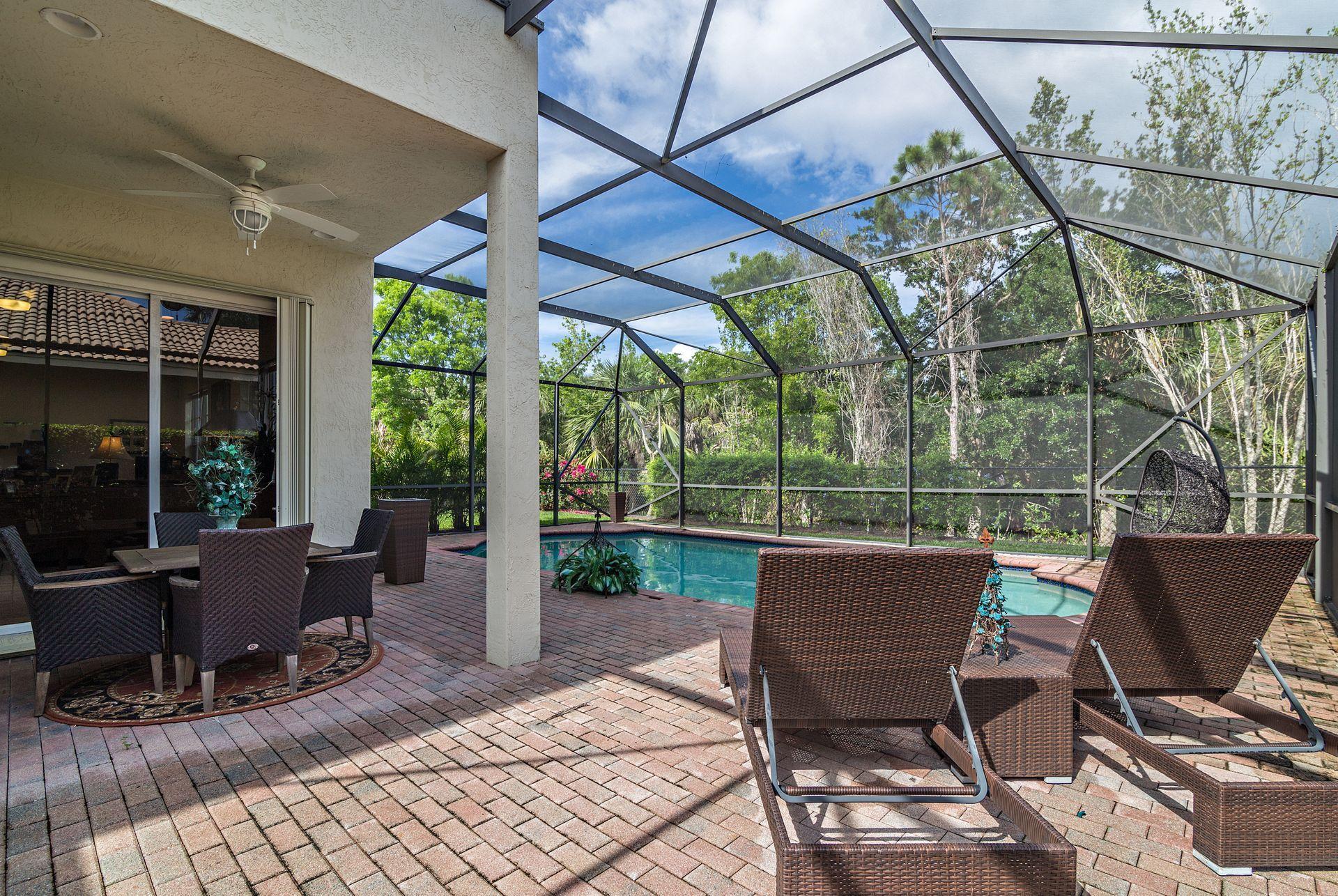 122 Via Castilla Jupiter, FL 33458 - Photo 29 of 40 Poolside