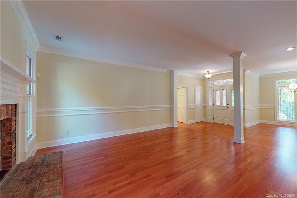 681 Portpatrick Place Fort Mill, SC 29708 - Photo 14 of 47 a view of empty room with wooden floor