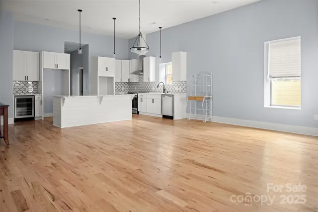wooden floor and kitchen view