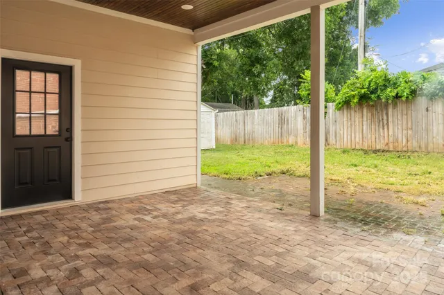 a view of a backyard with a garden
