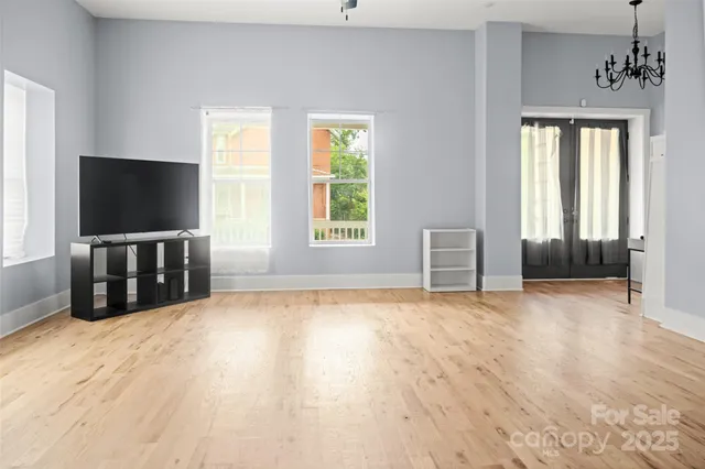 a view of livingroom with furniture and windows