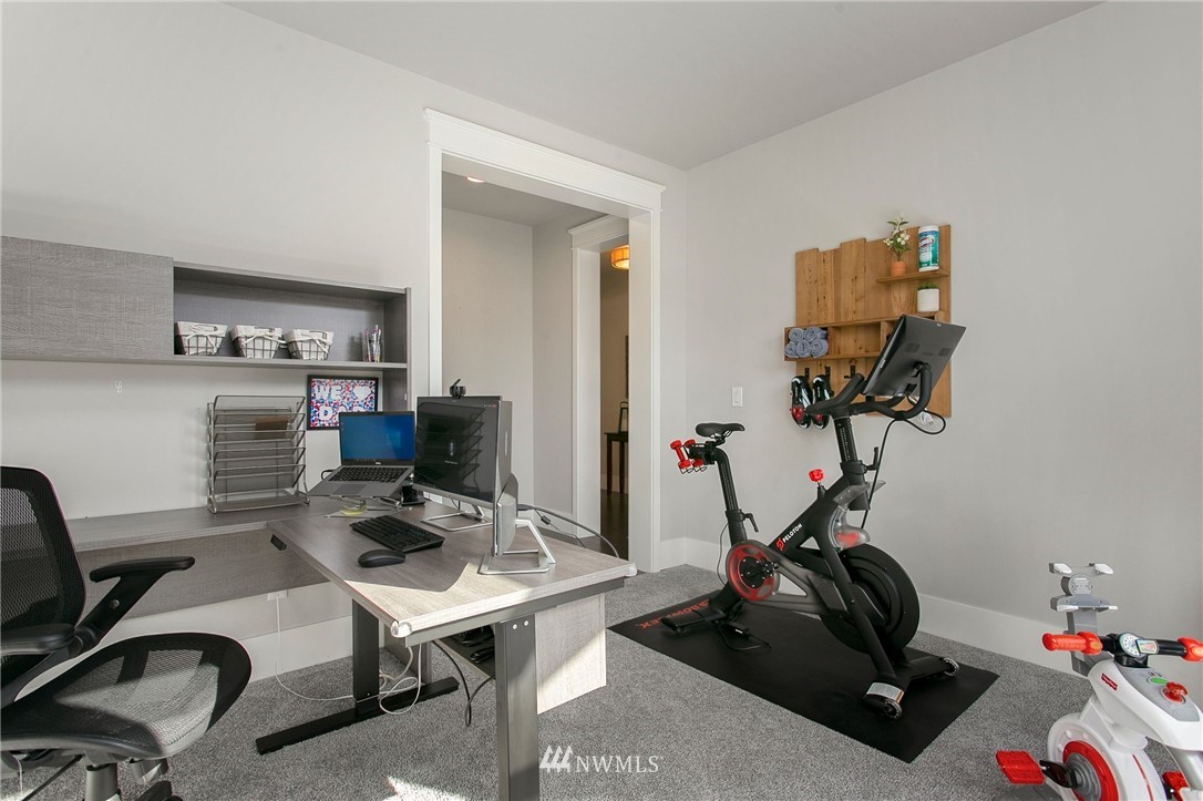 322 Graham Avenue Southeast Renton, WA 98059 - Photo 13 of 39 a view of a workspace with furniture