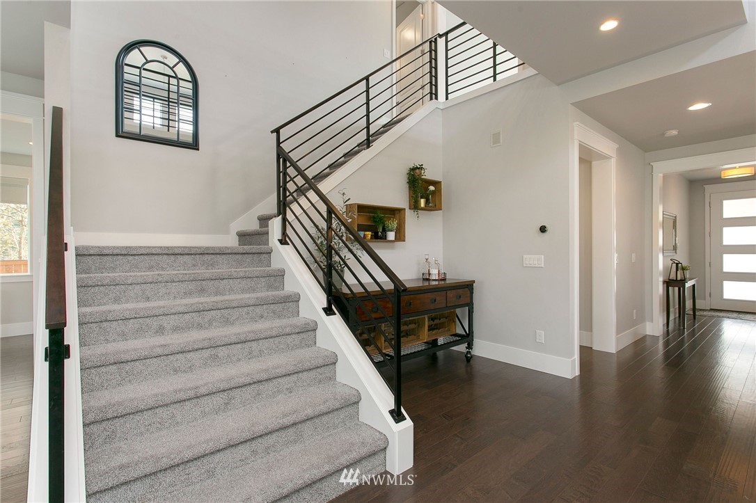 322 Graham Avenue Southeast Renton, WA 98059 - Photo 15 of 39 a view of entryway and hall with wooden floor