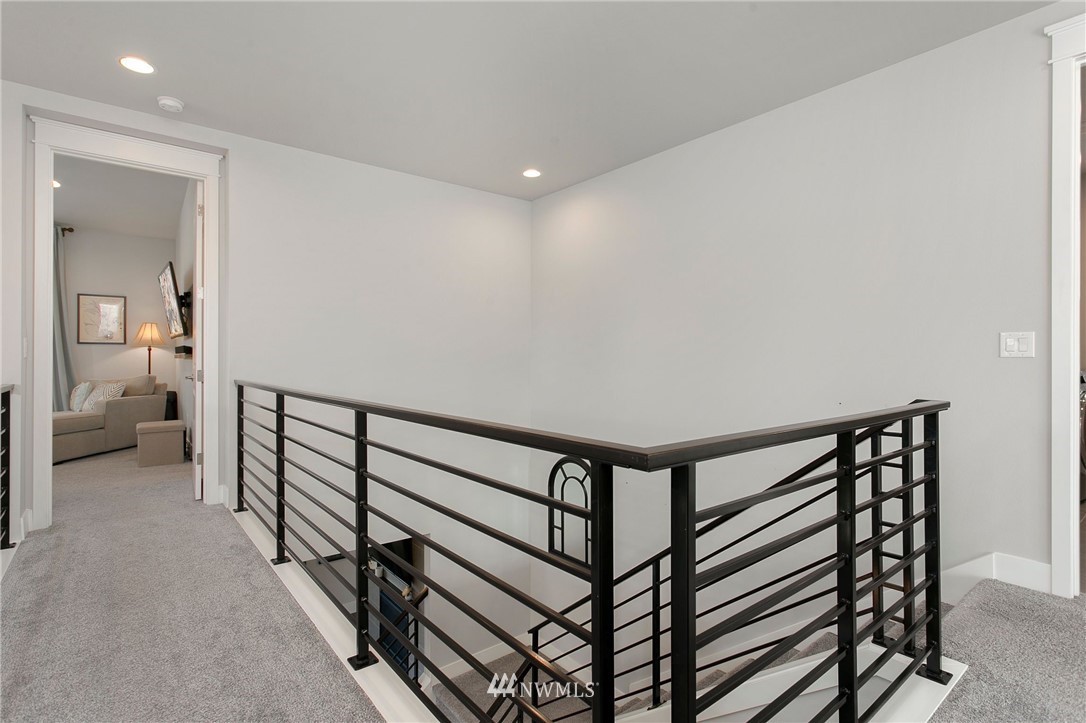 322 Graham Avenue Southeast Renton, WA 98059 - Photo 16 of 39 a view of a hallway with entryway and stairs