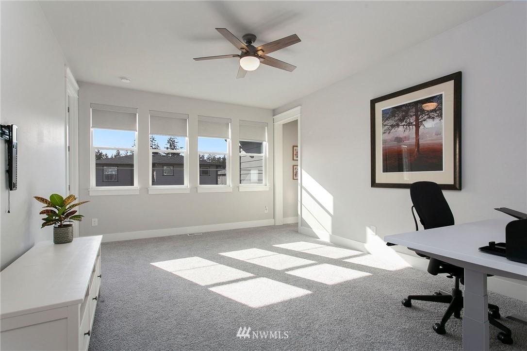 322 Graham Avenue Southeast Renton, WA 98059 - Photo 24 of 39 a workspace with furniture window and wooden floor