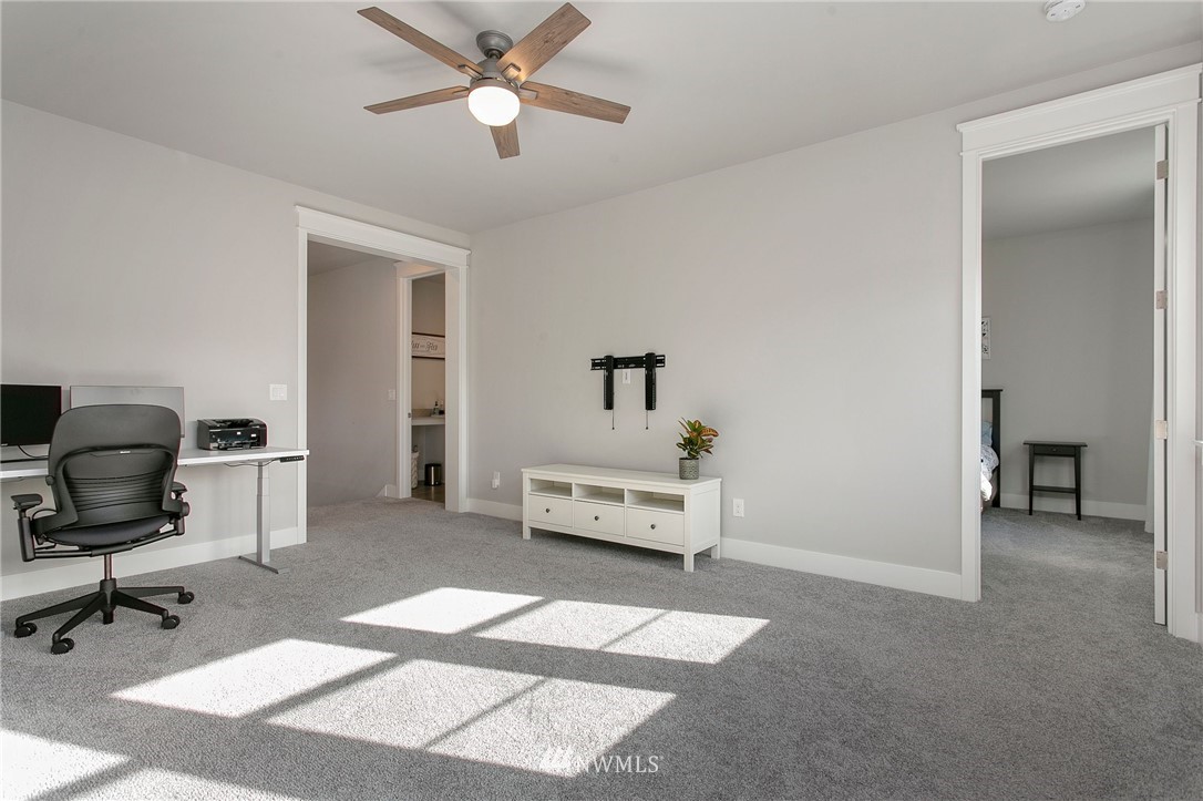322 Graham Avenue Southeast Renton, WA 98059 - Photo 25 of 39 a bedroom with a workspace