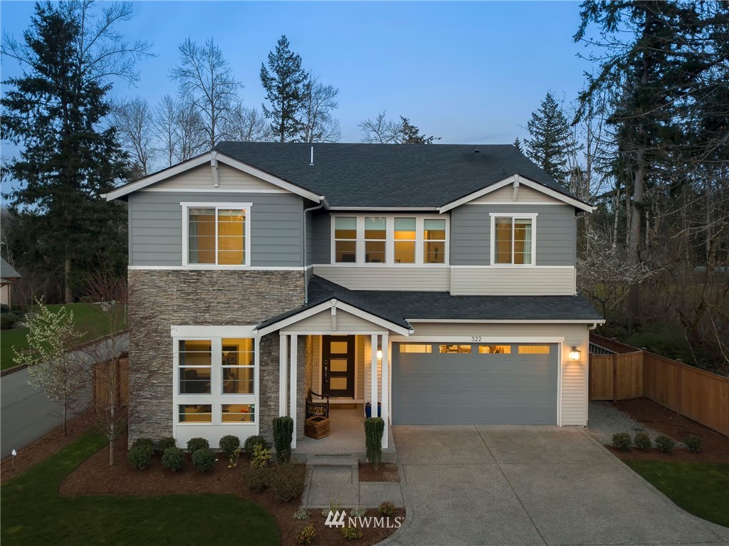 322 Graham Avenue Southeast Renton, WA 98059 - Photo 38 of 39 front view of house with a yard