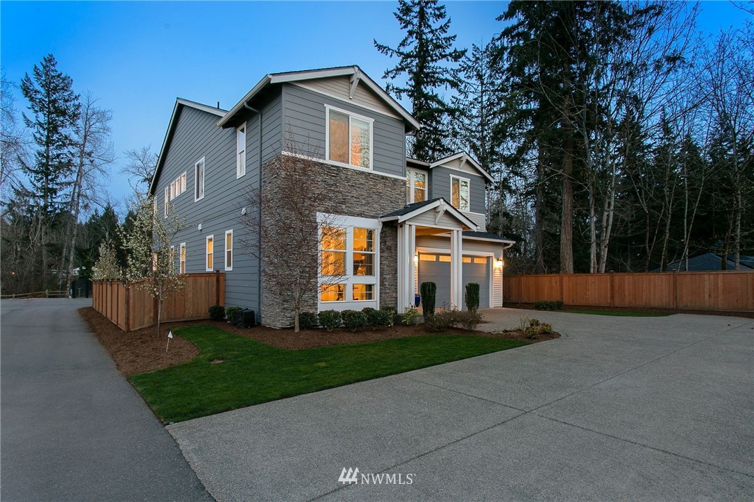 322 Graham Avenue Southeast Renton, WA 98059 - Photo 39 of 39 a front view of a house with a yard and trees