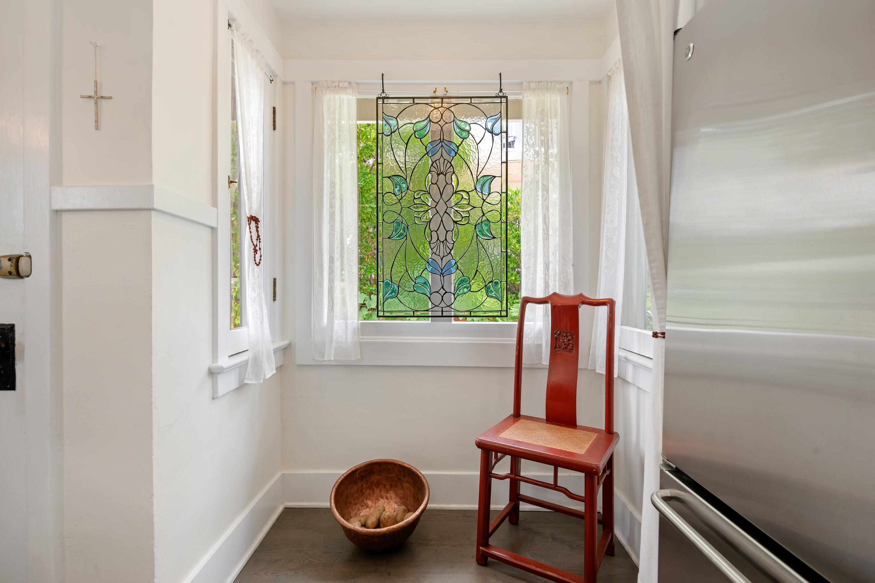 512 East Islay Street Santa Barbara, CA 93101 - Photo 12 of 25 a bathroom with a window and a wooden floor