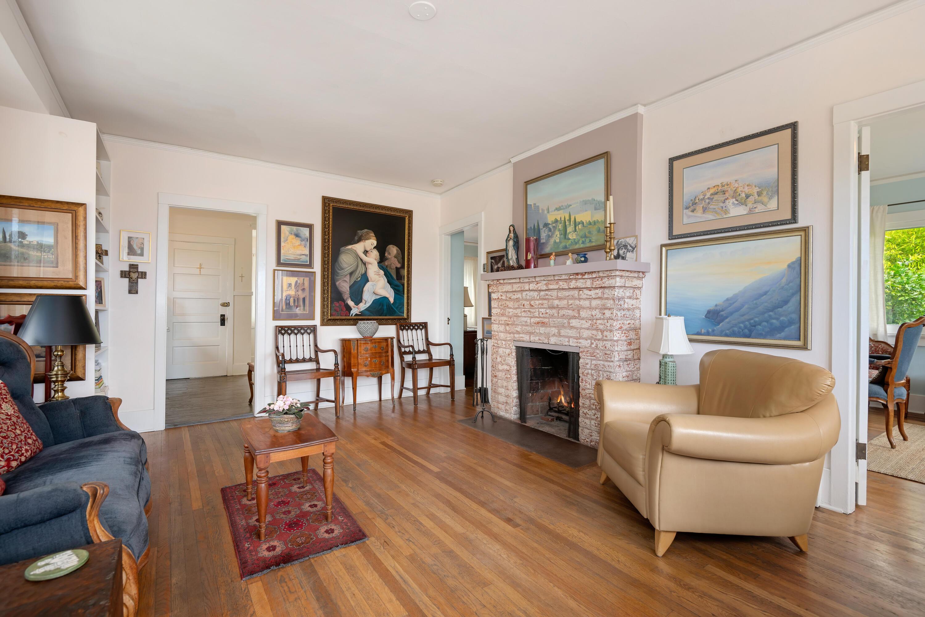 512 East Islay Street Santa Barbara, CA 93101 - Photo 8 of 25 a living room with furniture and a fireplace