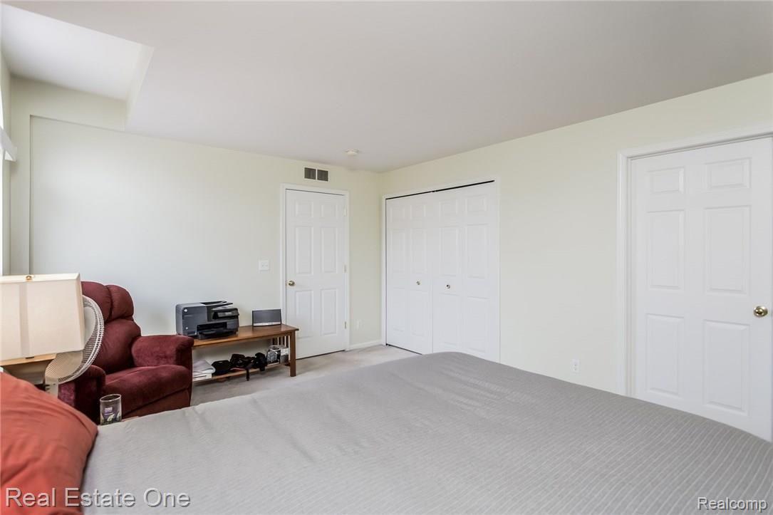 3635 Tremonte Circle, Unit 251 Rochester, MI 48306 - Photo 18 of 38 018-Master_Bedroom-2411534-medium.jpg