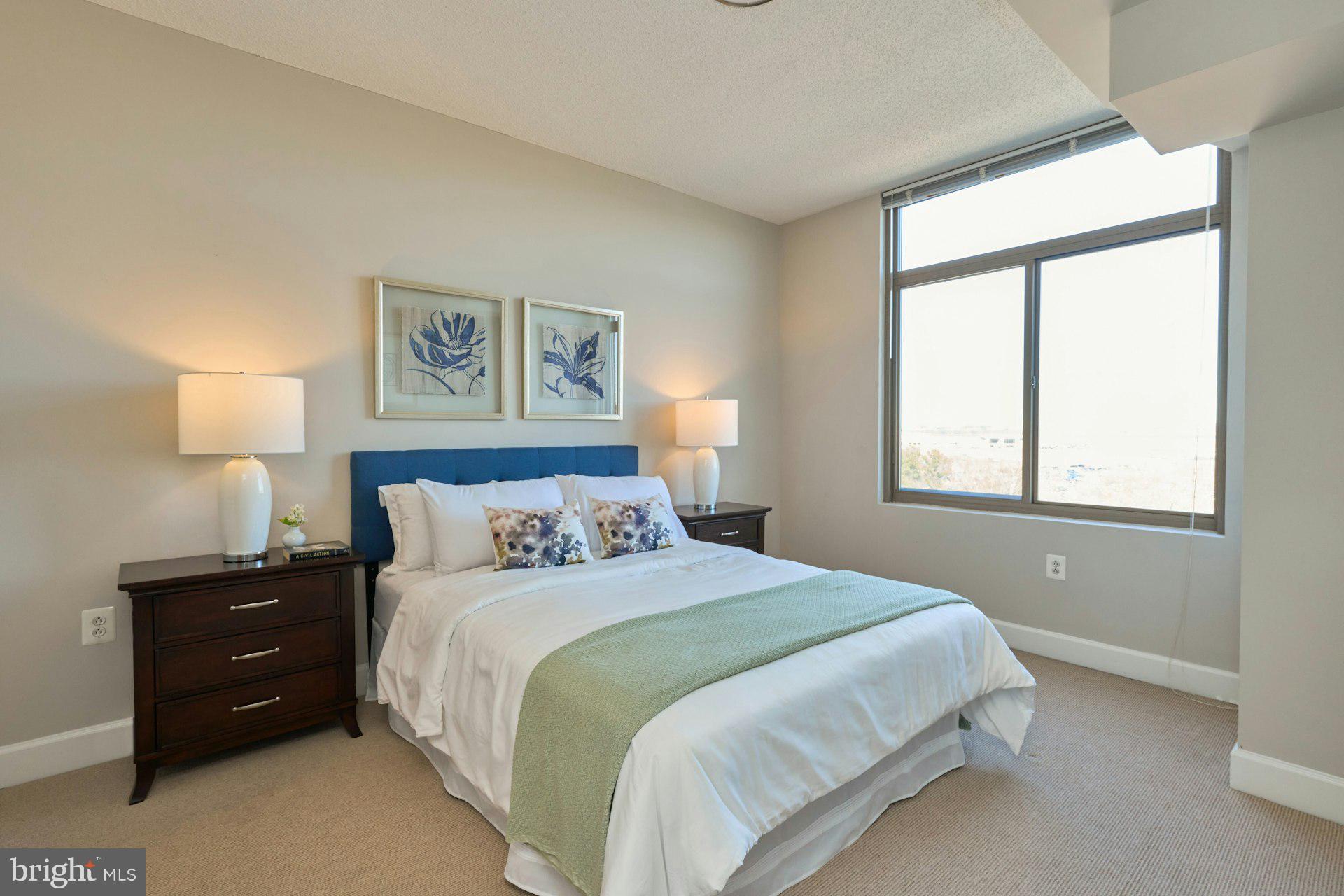 3650 South Glebe Road, Unit 652 Arlington, VA 22202 - Photo 23 of 54 a bedroom with a bed and a window