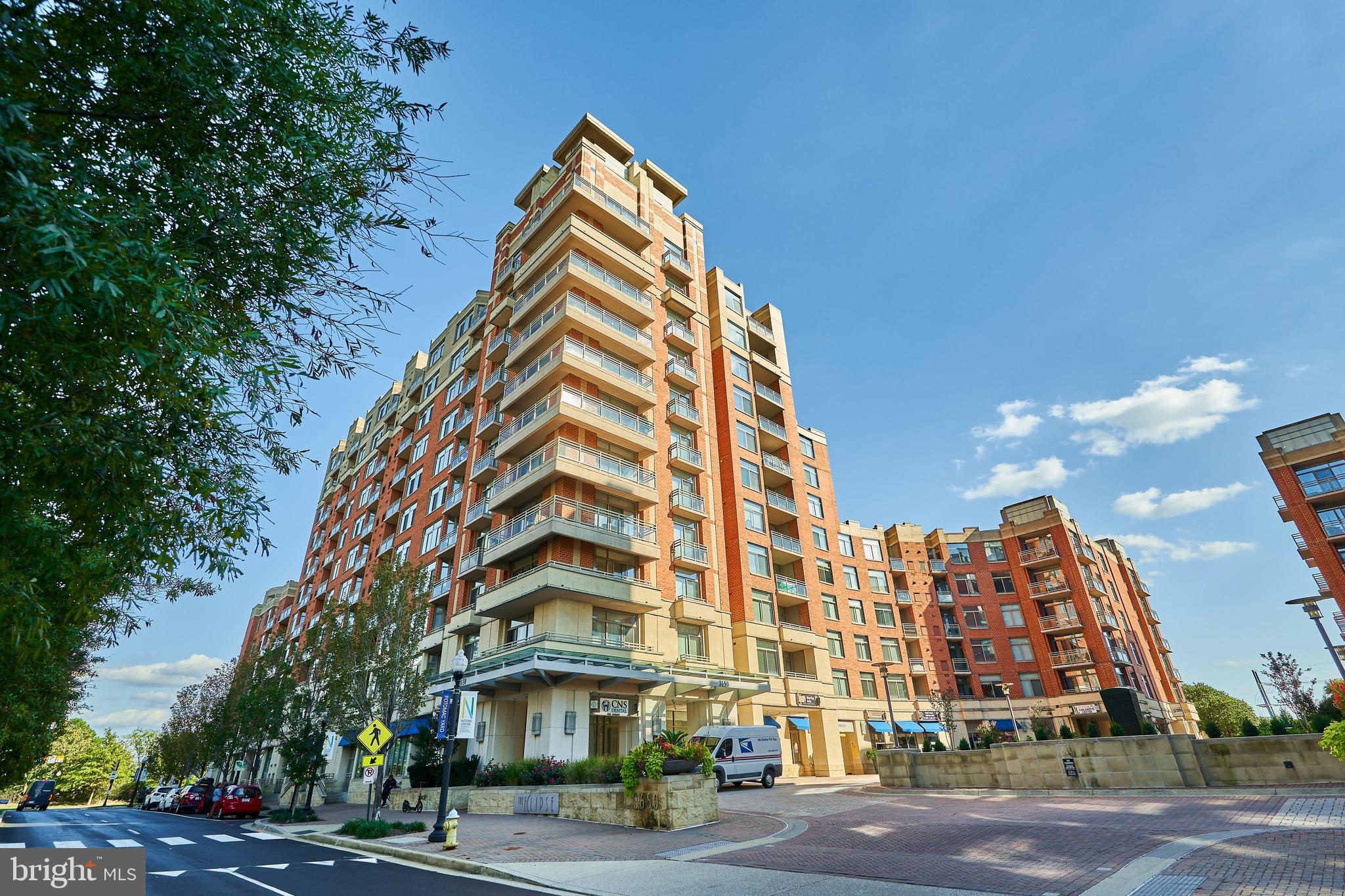 3650 South Glebe Road, Unit 652 Arlington, VA 22202 - Photo 3 of 54 a view of a tall building next to a road