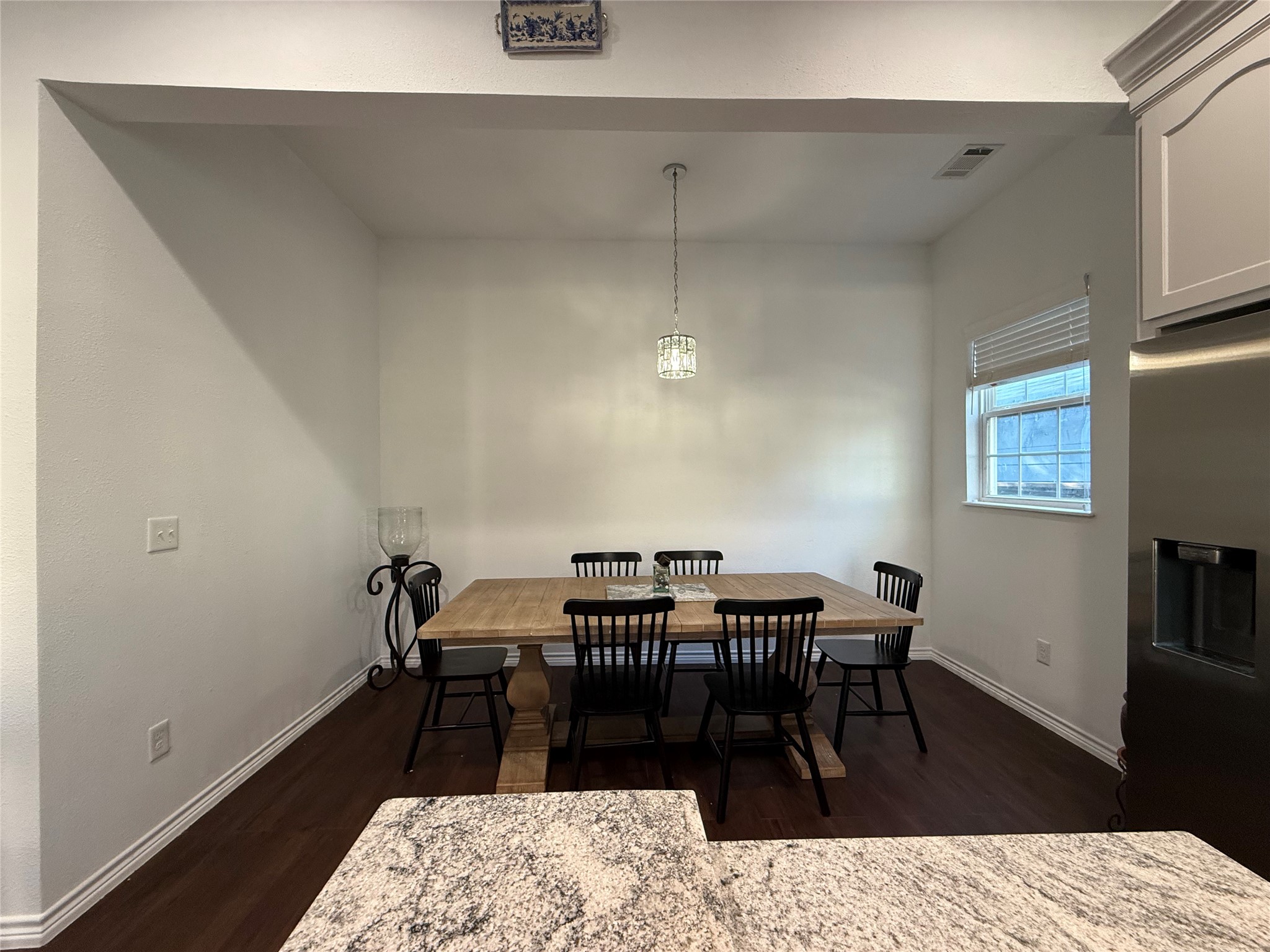 1717 Weber Street Houston, TX 77007 - Photo 8 of 12 a view of a dining room with furniture
