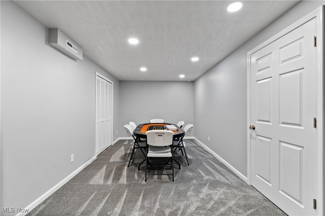 4467 Ridgestone Way Medina, OH 44256 - Photo 26 of 31 Carpeted dining space featuring a textured ceiling