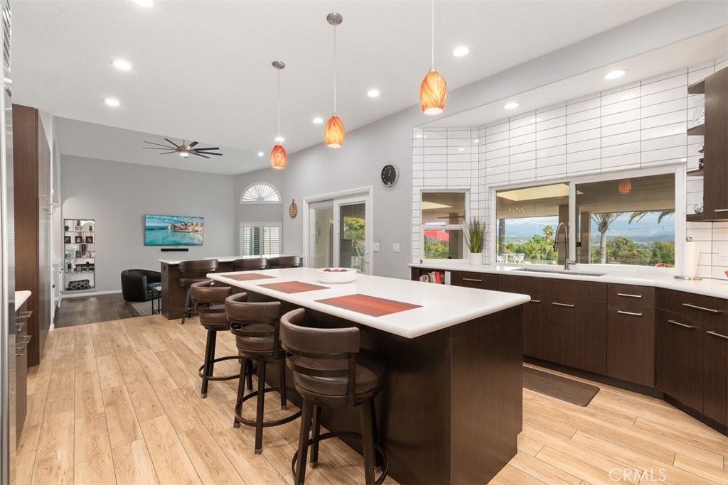 3950 Concordia Lane Fallbrook, CA 92028 - Photo 19 of 51 a open kitchen with a table and chairs in it