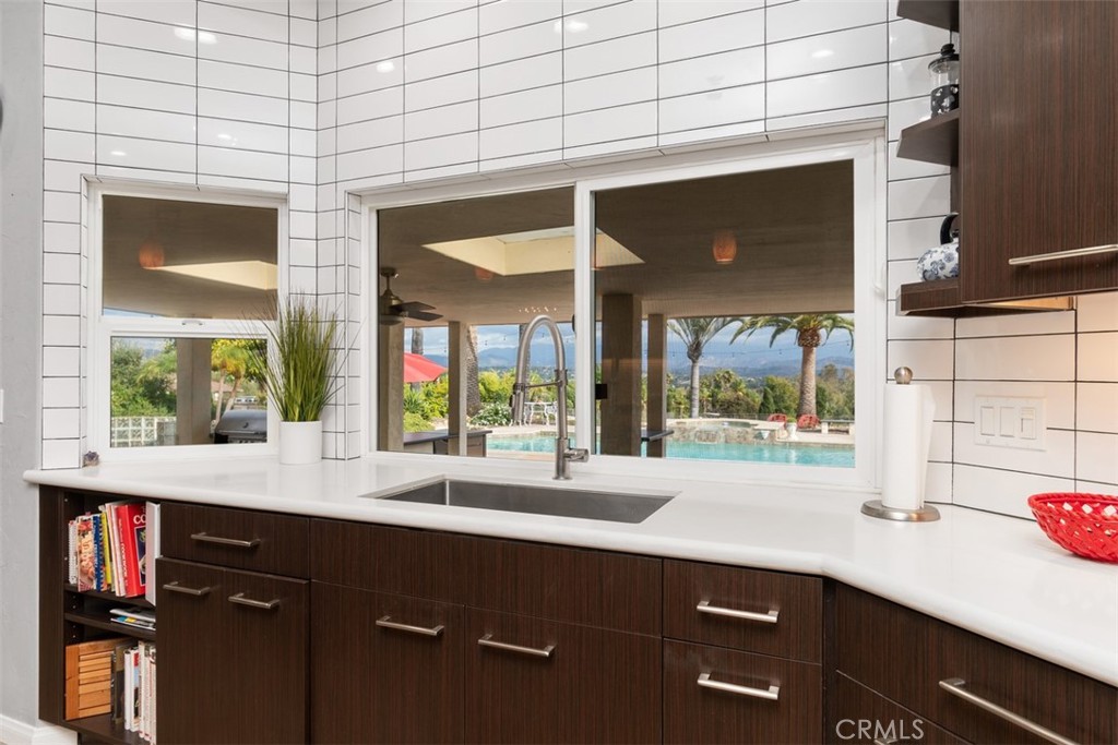 3950 Concordia Lane Fallbrook, CA 92028 - Photo 20 of 51 a kitchen with a sink and a large window