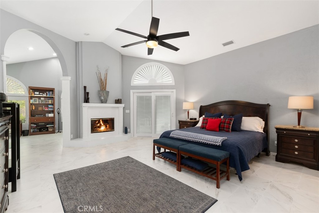 3950 Concordia Lane Fallbrook, CA 92028 - Photo 23 of 51 a bedroom with furniture and a fireplace