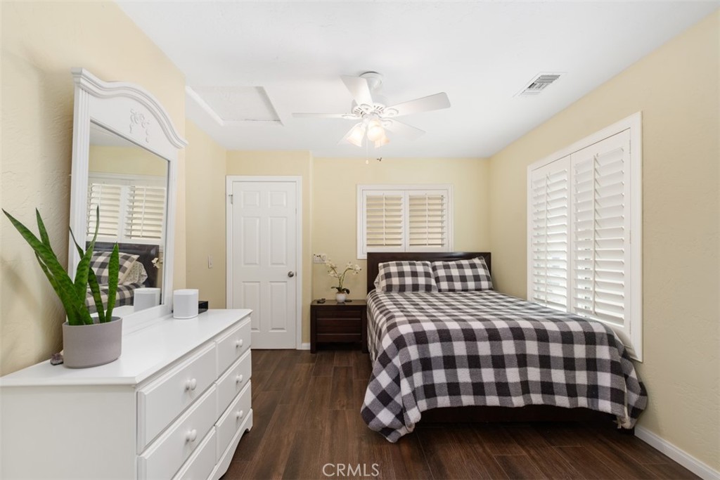 3950 Concordia Lane Fallbrook, CA 92028 - Photo 29 of 51 a bedroom with a bed and a chandelier