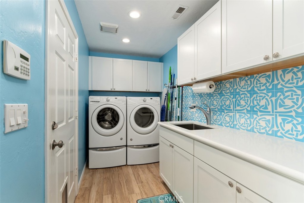 3950 Concordia Lane Fallbrook, CA 92028 - Photo 31 of 51 a view of a kitchen with washer and dryer