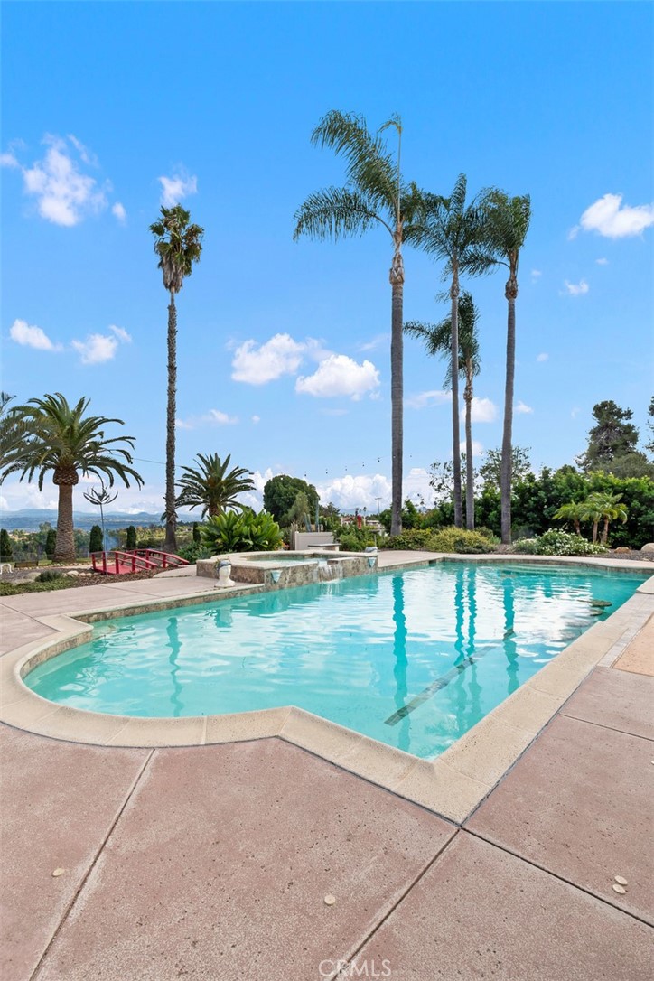 3950 Concordia Lane Fallbrook, CA 92028 - Photo 42 of 51 a view of a swimming pool with a yard