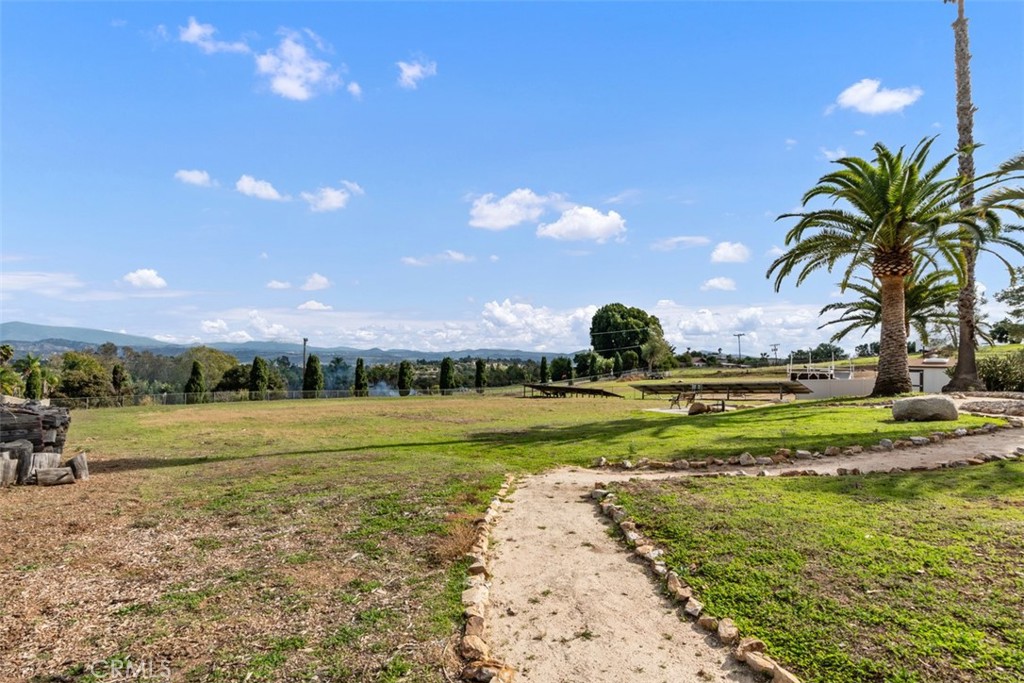 3950 Concordia Lane Fallbrook, CA 92028 - Photo 46 of 51 a view of a golf course with a house