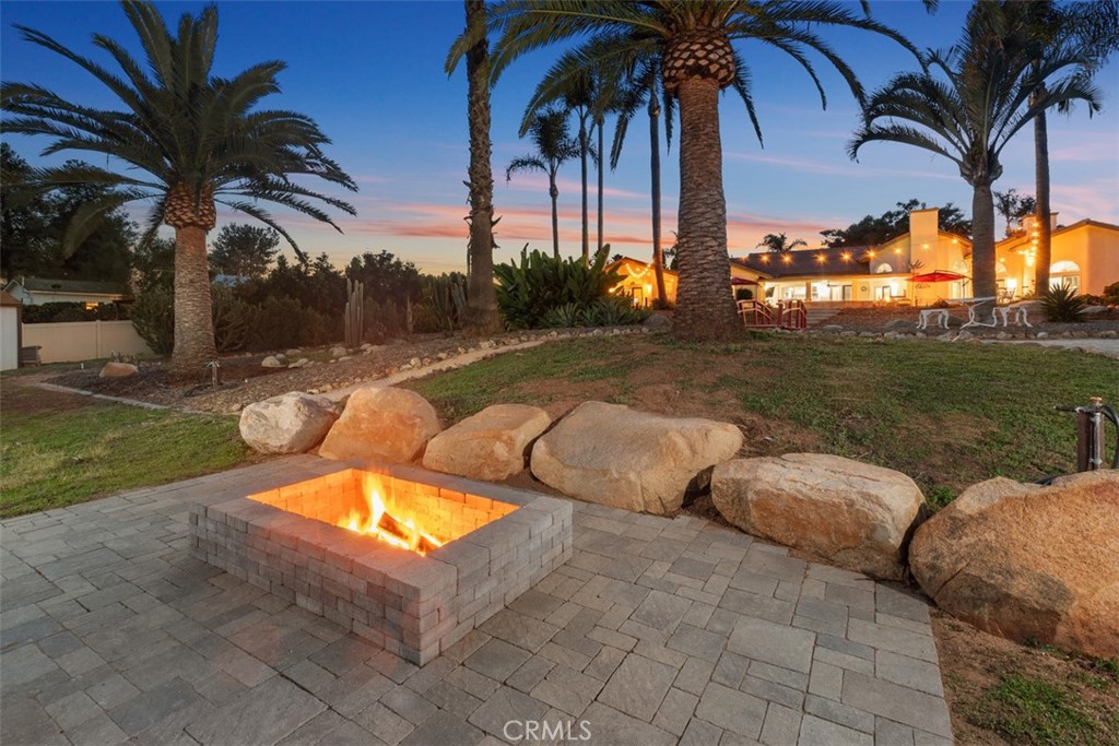 3950 Concordia Lane Fallbrook, CA 92028 - Photo 5 of 51 a view of swimming pool with a table and chairs