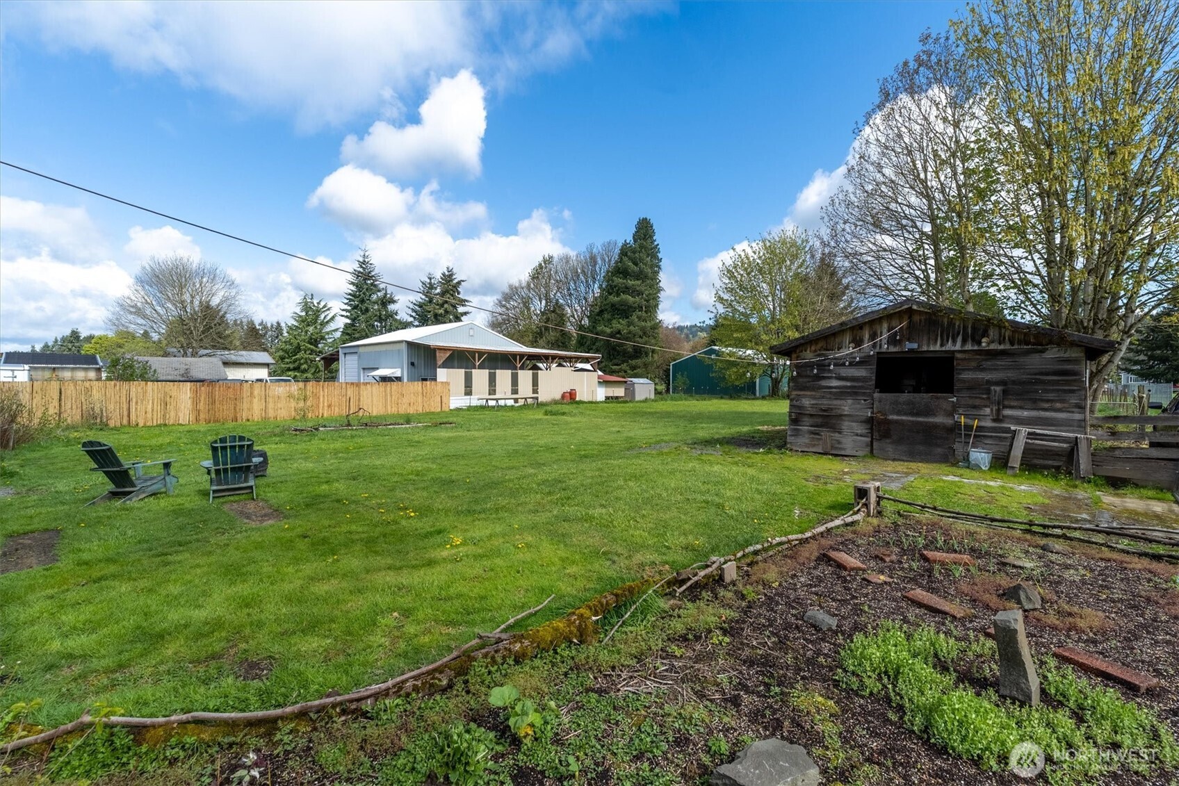 3302 Pine Street Longview, WA 98632 - Photo 25 of 39 a view of a house with a yard