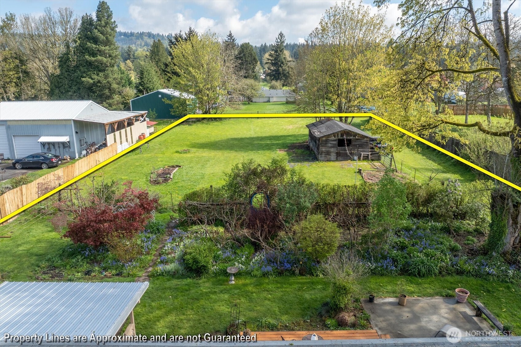 3302 Pine Street Longview, WA 98632 - Photo 31 of 39 a view of a swimming pool with a garden