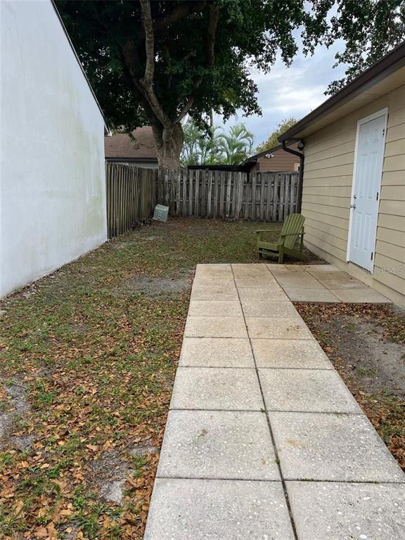 1400 Southwest 85th Terrace Pembroke Pines, FL 33025 - Photo 2 of 11 a view of backyard with a garden