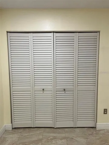 a view of a room with a window