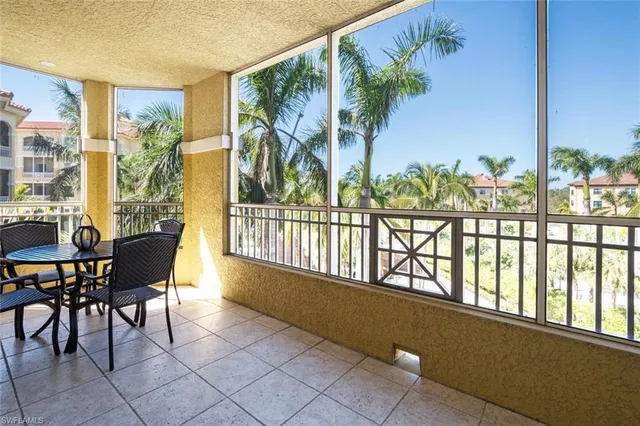 a view of balcony with furniture