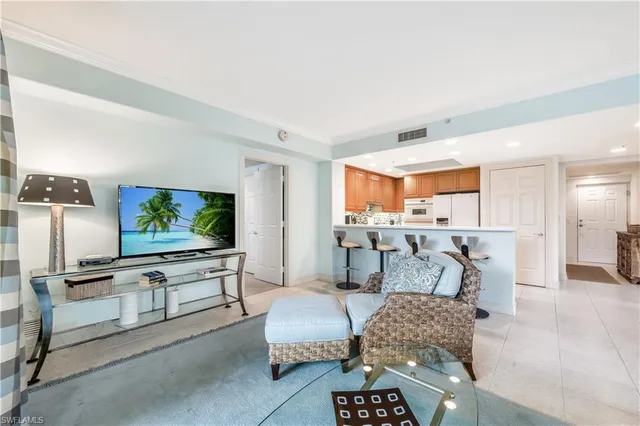 a front view of a building with a garden