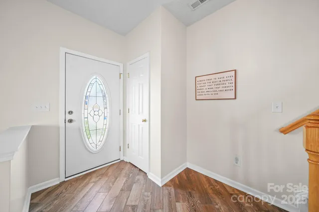 a view of small space with wooden floor