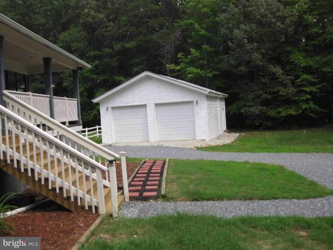 261 Quarry Road Stafford, VA 22554 - Photo 6 of 22 Walkway from garage to house entrance