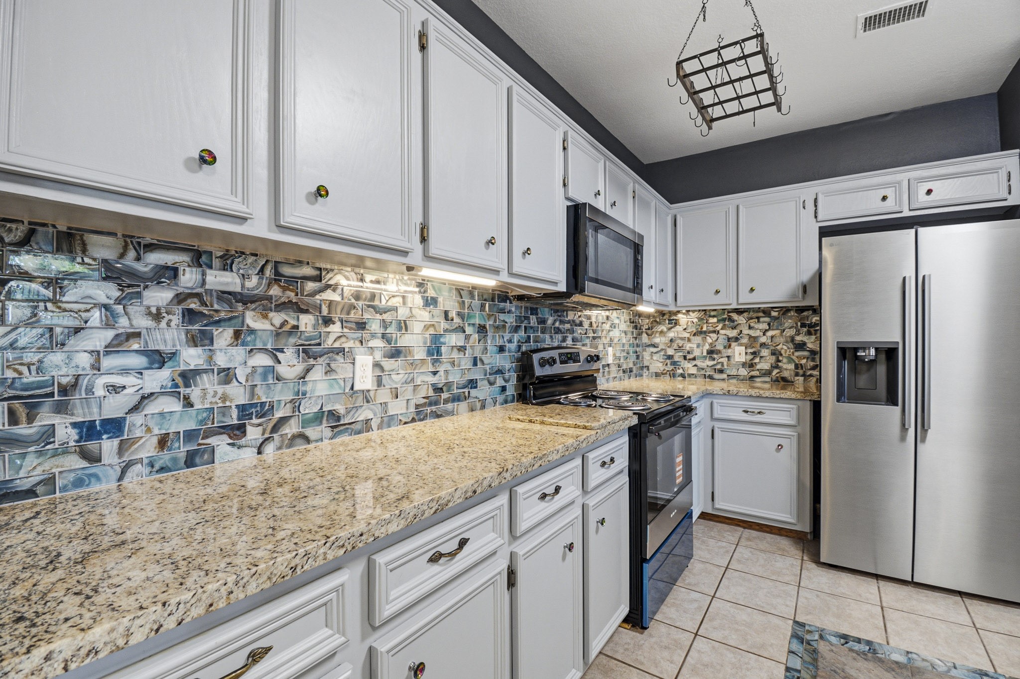 12557 Marina Loop Willis, TX 77318 - Photo 8 of 36 Kitchen offers plenty of cabinet space